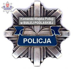 gwiazda policyjna z napisem Komenda Miejska Policji w Białej Podlaskiej i napis Policja