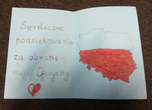 wnętrze laurki, napis serdeczne podziękowania za obronę mojej Ojczyzny. Po drugiej kontury  Polski pomalowane na biało-czerwono