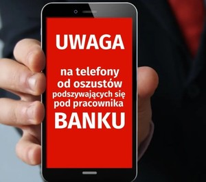 Napis:" Uwaga na telefony od oszustów podszywających się pod pracownika Banku'